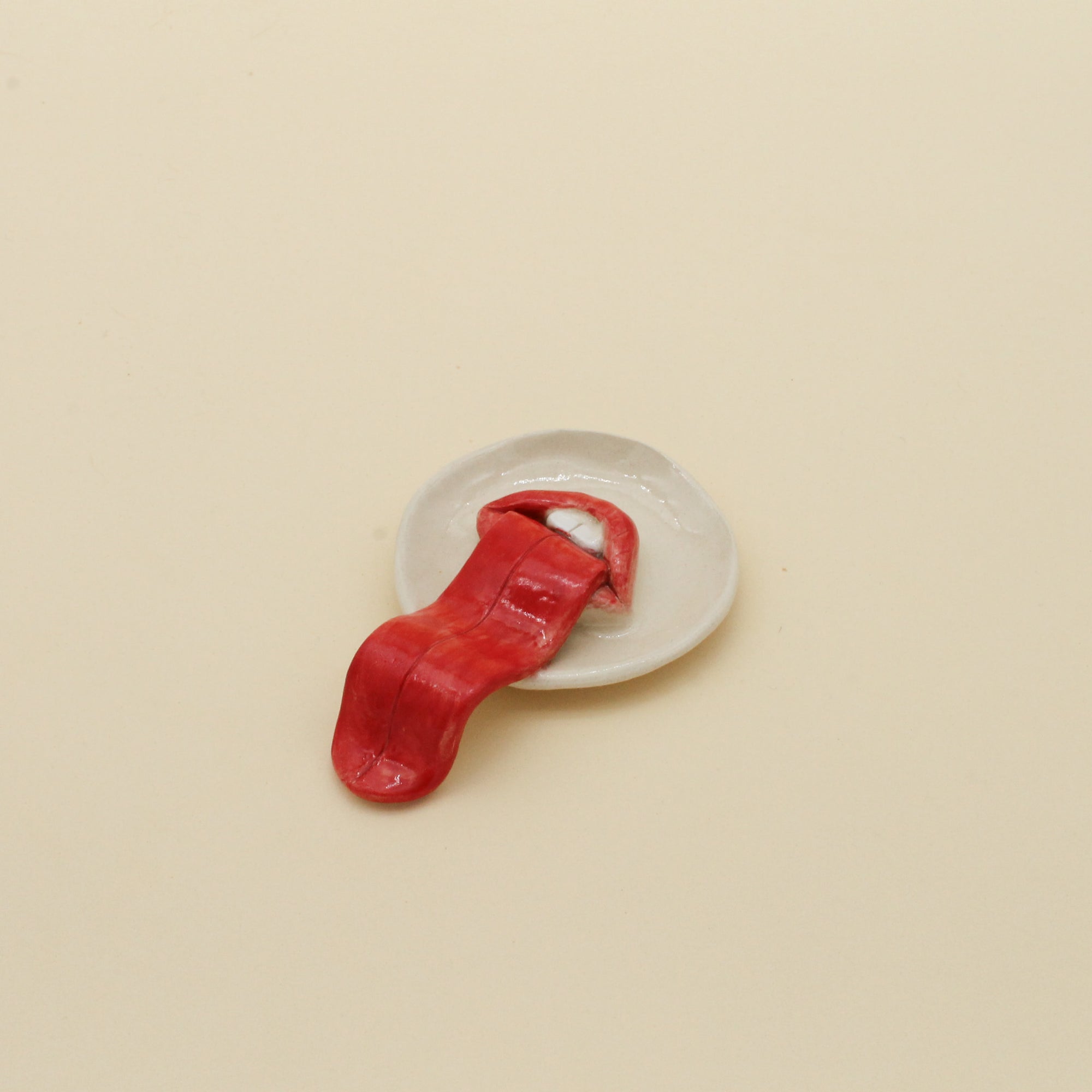 Long tongue trinket tray dish