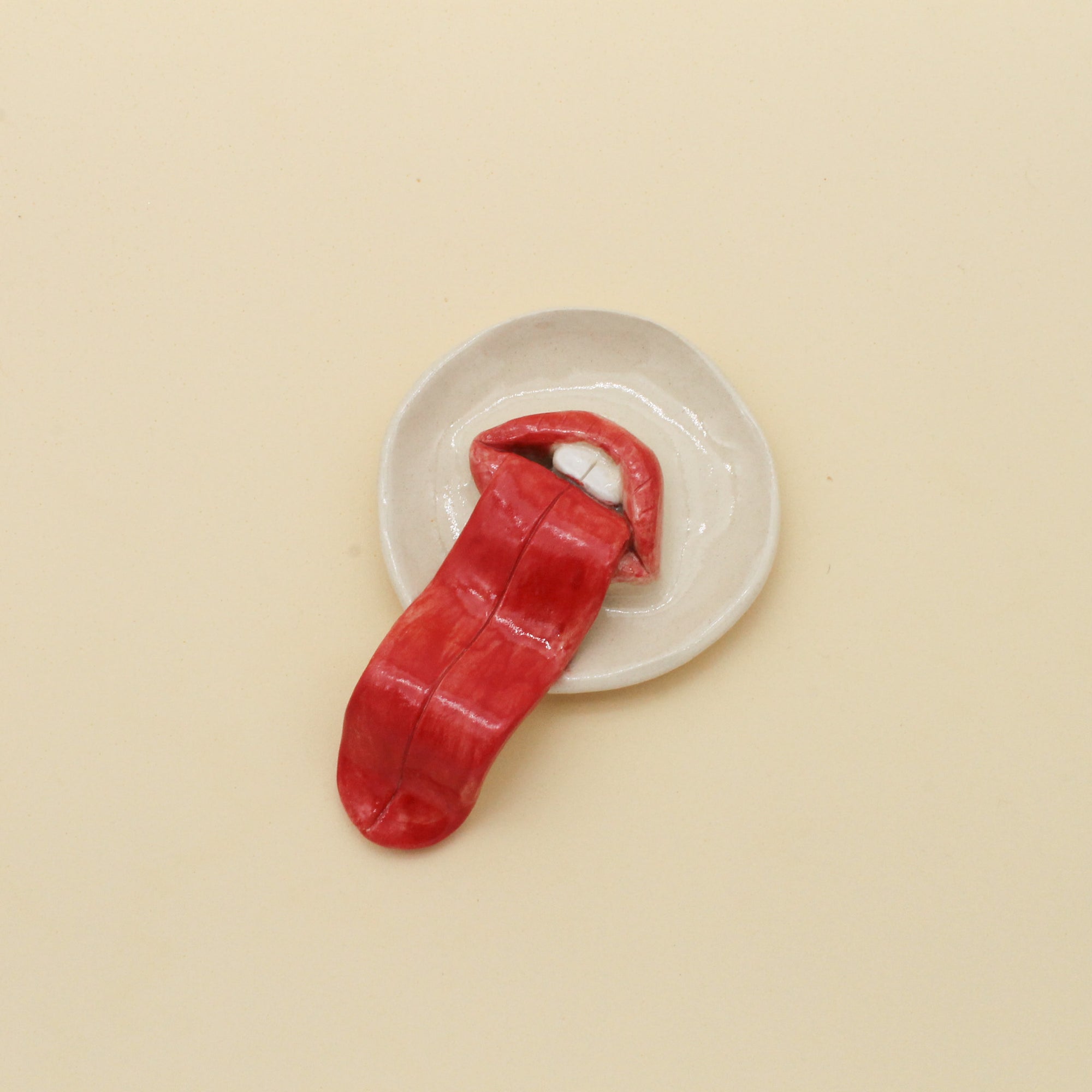 Long tongue trinket tray dish